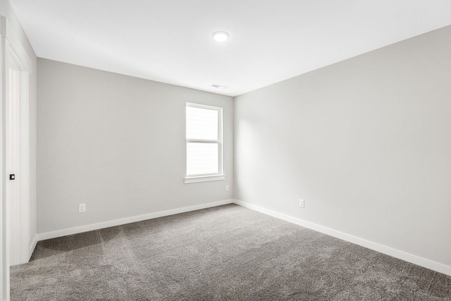 Spacious, unfurnished interior of a new home in Calista Farms, White House (Image 28).