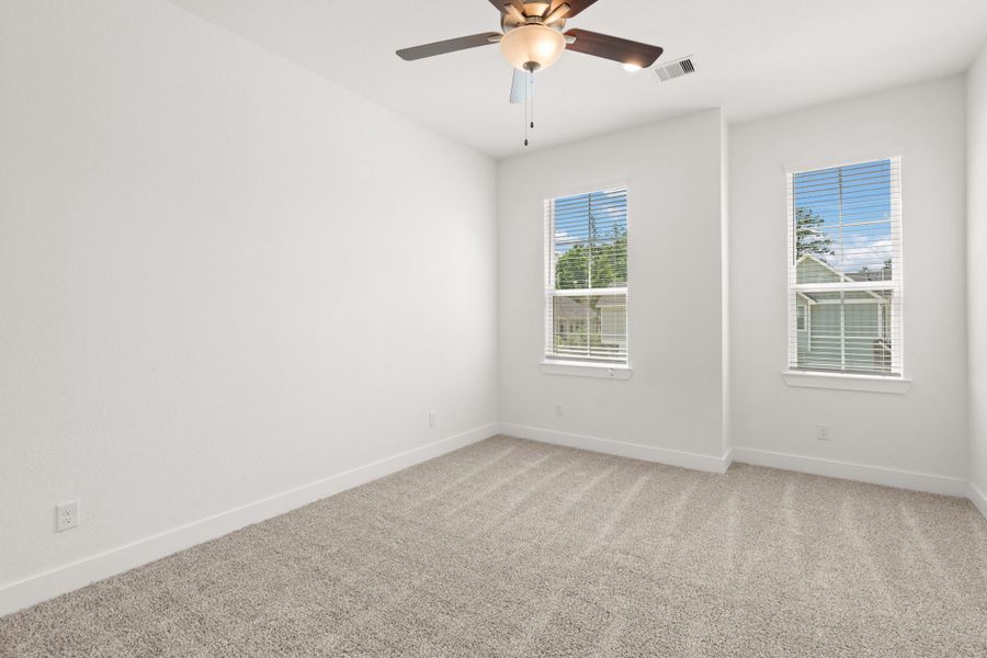 Spacious, unfurnished interior of a new home in Meridiana, Manvel (Image 24).