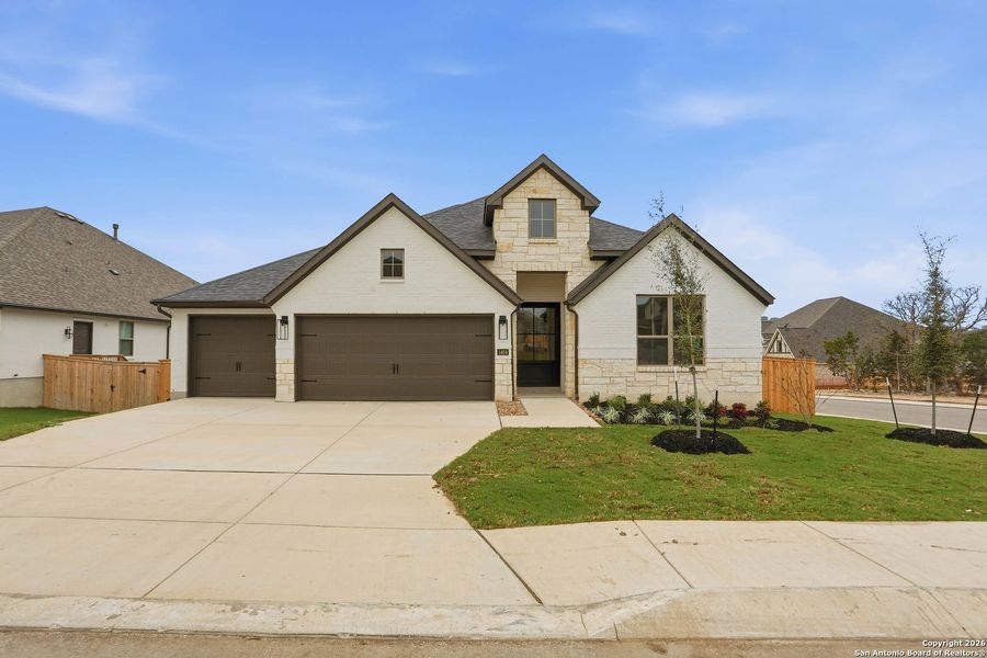 Front exterior of a new home in Kinder Ranch - 70', San Antonio, TX, highlighting curb appeal (Image 25).