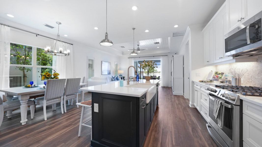 Furnished interior view inside a new home in SkySail Real Estate and Homes for Sale in Naples, FL - Neal Communities, Naples (Image 14).
