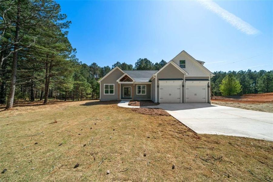 Front exterior of a new home in , Silver Creek, GA, highlighting curb appeal (Image 25). Front exterior of a new home in , Silver Creek, GA, highlighting curb appeal (Image 25).