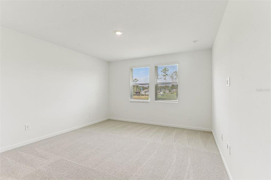 Spacious, unfurnished interior of a new home in Colbert Landings, Palm Coast (Image 20).