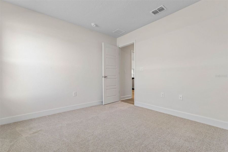 Representative unfurnished interior of a home built from the 2265 by Adams Homes in Veria, Oak Hill (Image 33).