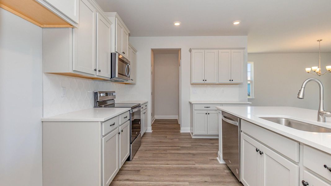 Furnished interior view inside a new home in The Cove at Mallard Crossing, Summerville (Image 9). Furnished interior view inside a new home in The Cove at Mallard Crossing, Summerville (Image 9).