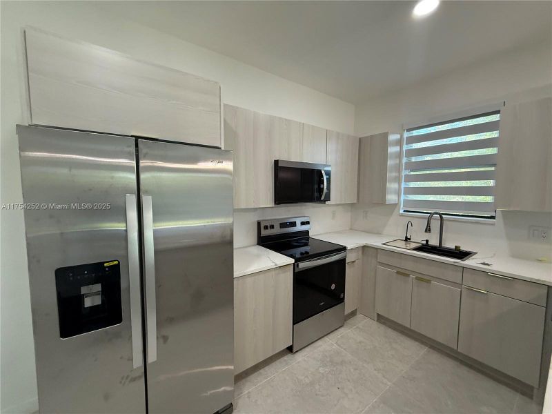Furnished interior view inside a new home in , Punta Gorda (Image 15).