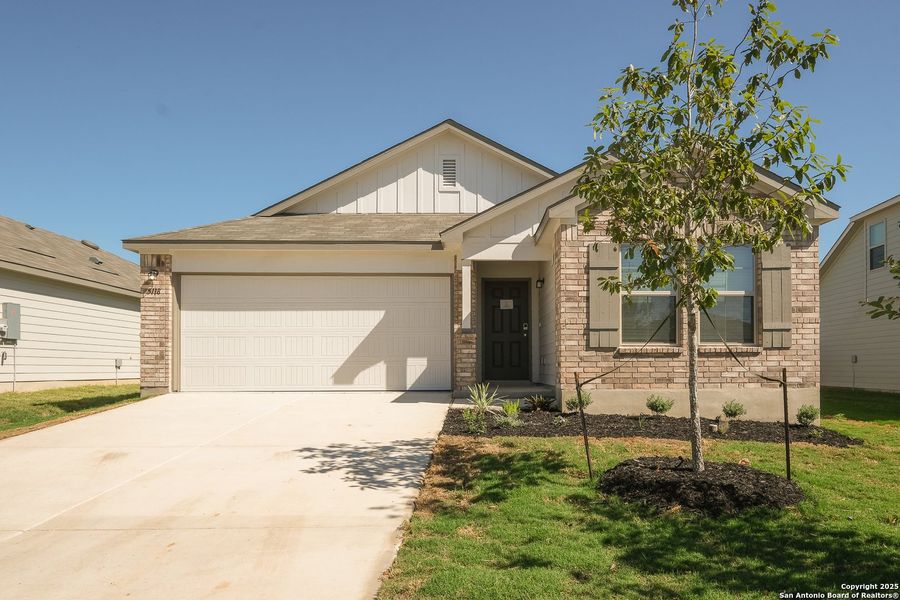 Front exterior of a new home in Blue Ridge Ranch, San Antonio, TX, highlighting curb appeal (Image 22).