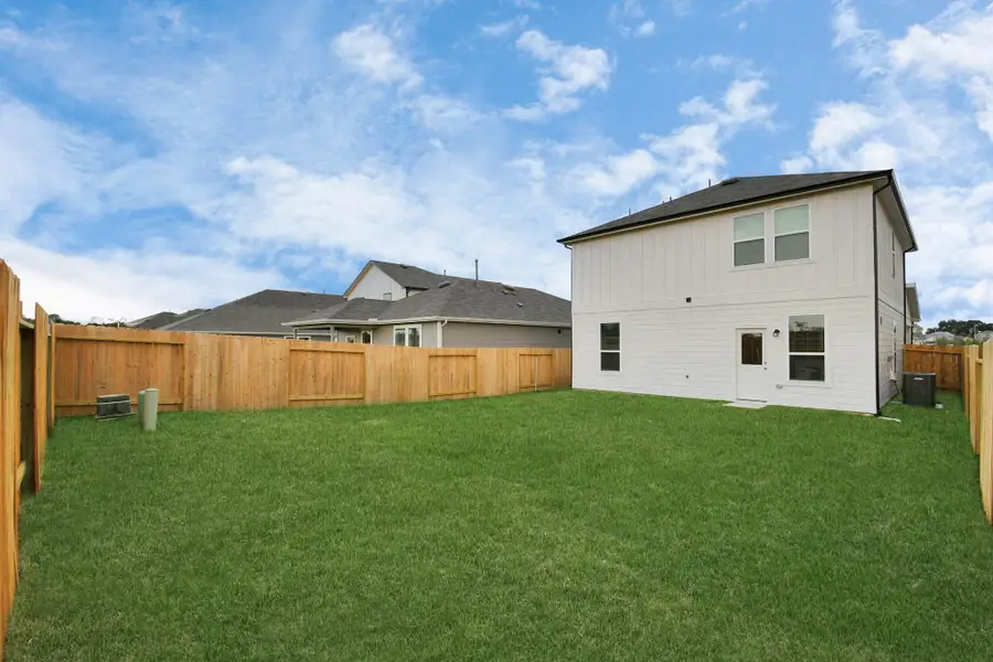 Exterior details and patio area of a home in Decker Farms, Magnolia (Image 2).
