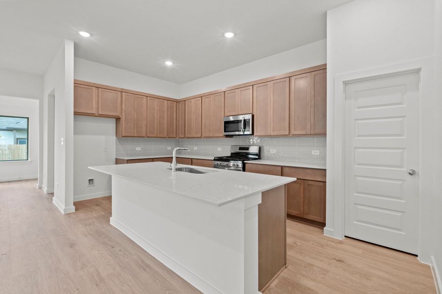 Furnished interior view inside a new home in Prairie Winds, Hutto (Image 9).