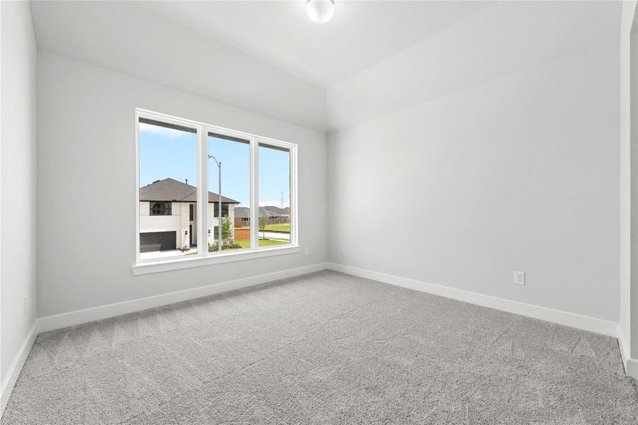 Spacious, unfurnished interior of a new home in Sunterra, Katy (Image 22).