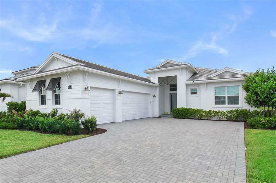 Front exterior of a new home in , Port St. Lucie, FL, highlighting curb appeal (Image 2). Front exterior of a new home in , Port St. Lucie, FL, highlighting curb appeal (Image 2).
