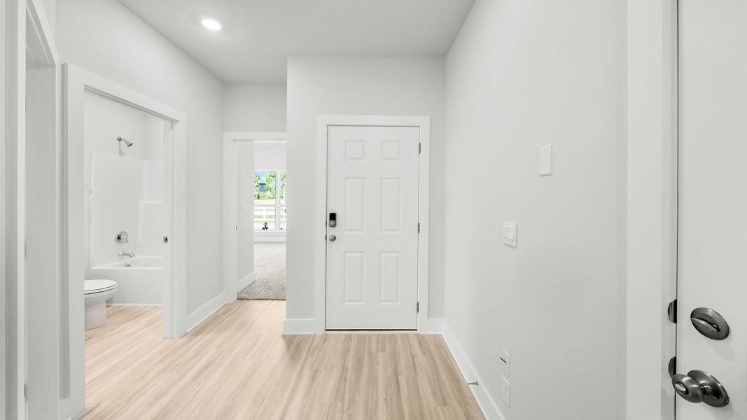 Representative unfurnished interior of a home built from the The Kennedy by D.R. Horton in Titus Park, Panama City (Image 11).