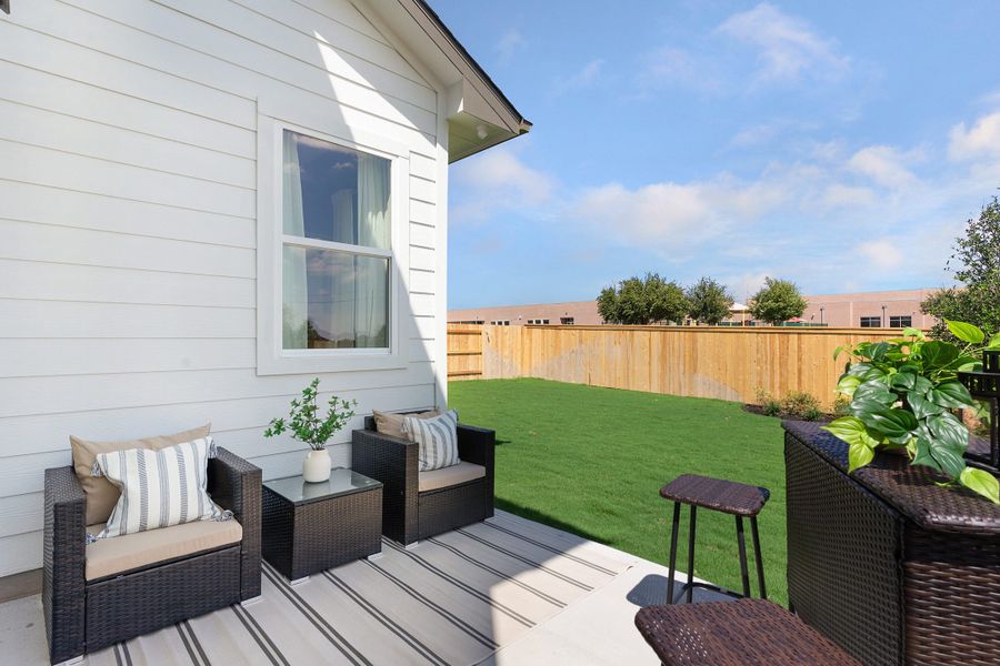 Front exterior of a new home in Briarwood, Elgin, TX, highlighting curb appeal (Image 28).
