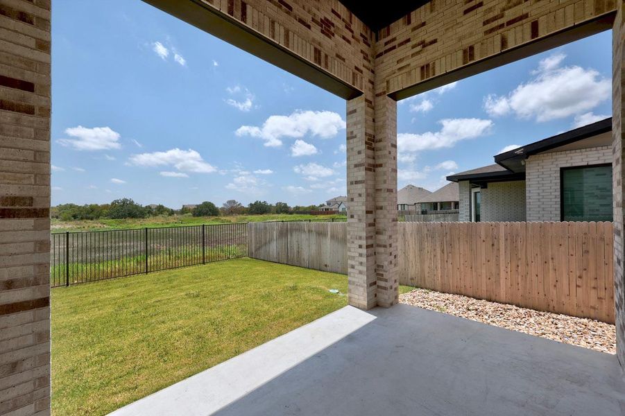 Exterior details and patio area of a home in Santa Rita Ranch, Liberty Hill (Image 16).
