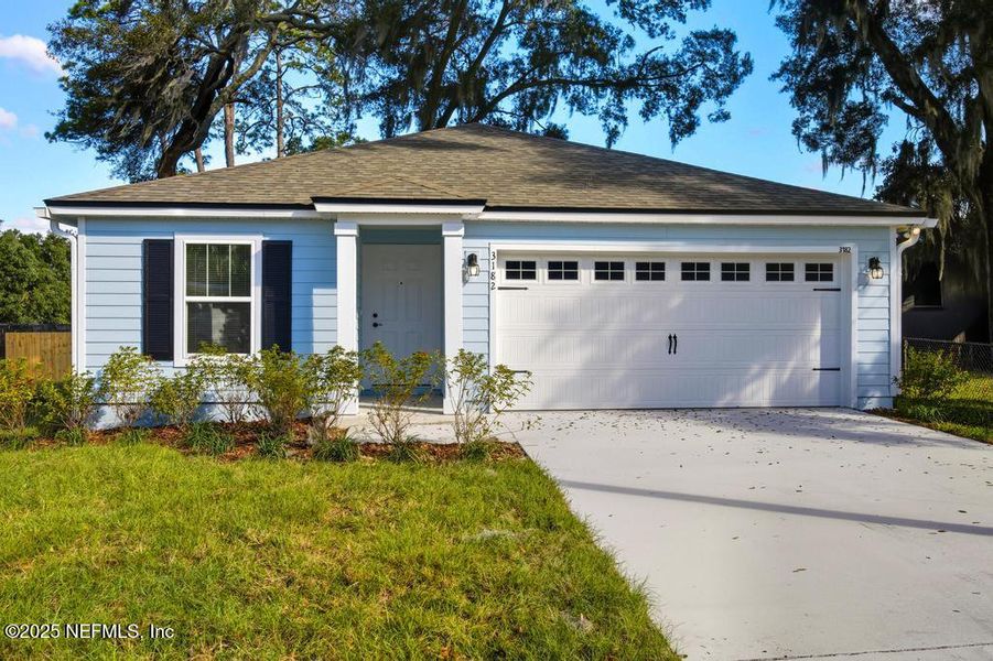 Front exterior of a new home in , Jacksonville, FL, highlighting curb appeal (Image 1). Front exterior of a new home in , Jacksonville, FL, highlighting curb appeal (Image 1).