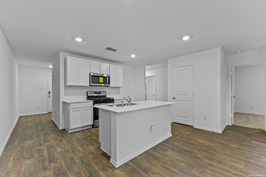 Furnished interior view inside a new home in Avenida, Converse (Image 8).