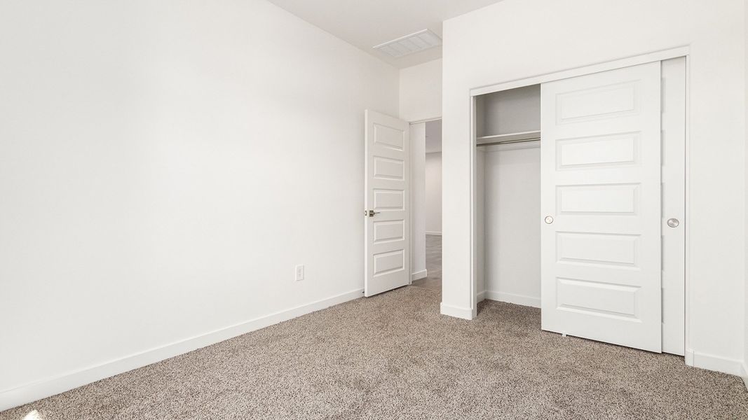 Representative unfurnished interior of a home built from the Baxter by D.R. Horton in The Oasis at Rocking K, Vail (Image 31).