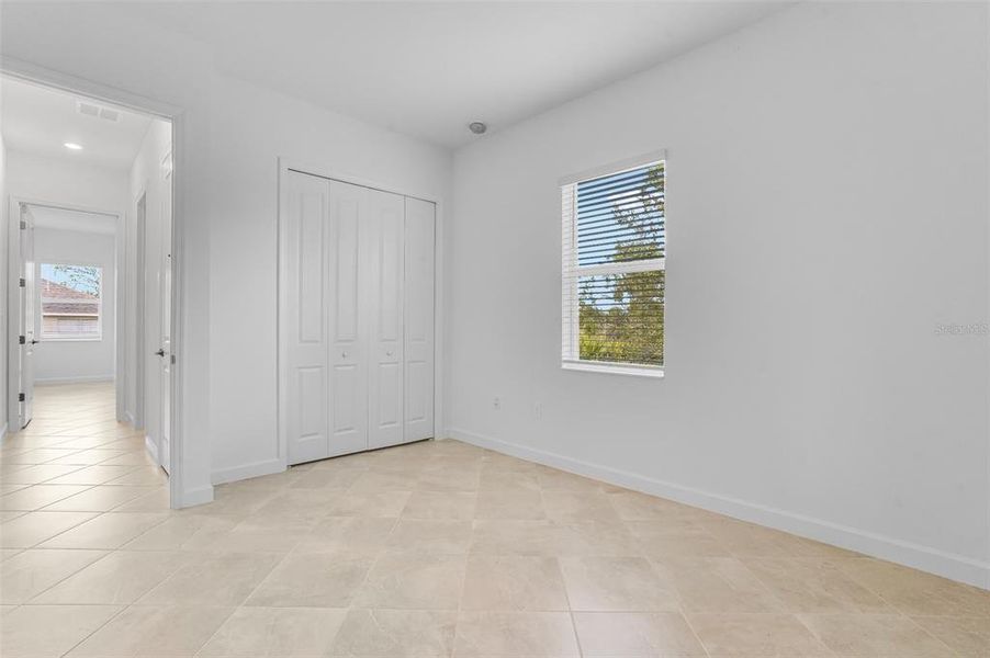 Spacious, unfurnished interior of a new home in South Gulf Cove, Port Charlotte (Image 28).