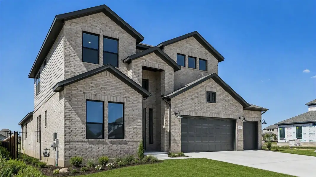 Representative exterior photo of a completed home built from the Anderson by Taylor Morrison in Easton Park, Austin, TX (Image 27).