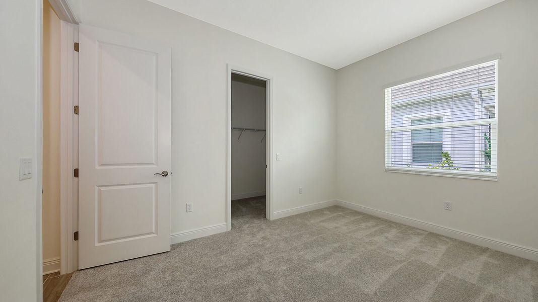 Spacious, unfurnished interior of a new home in Wildleaf at North River Ranch, Parrish (Image 41).