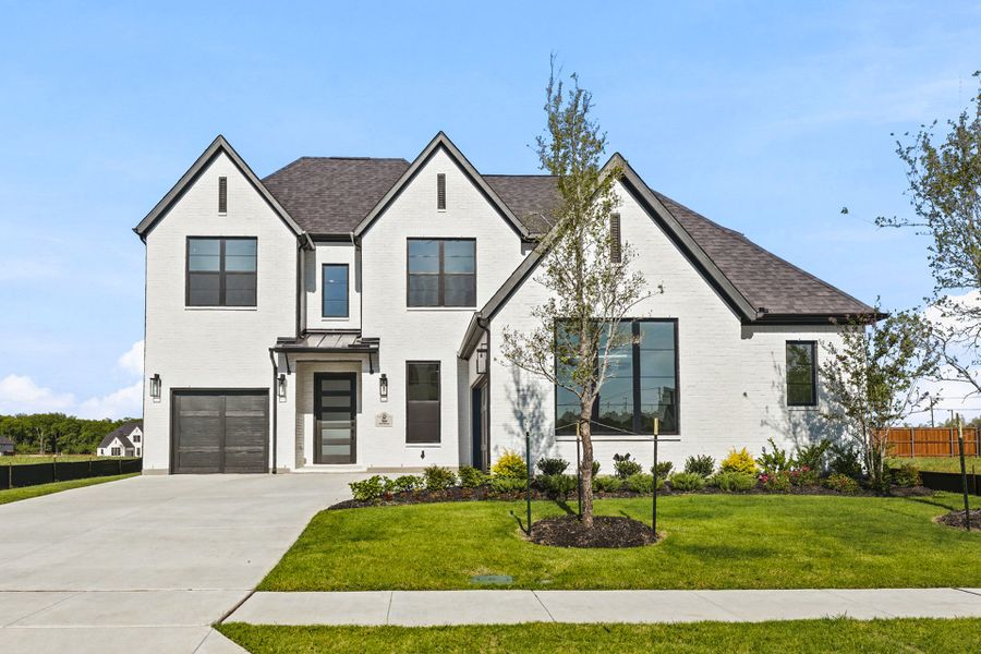 Front exterior of a new home in Custer Ridge Estates, Allen, TX, highlighting curb appeal (Image 26).