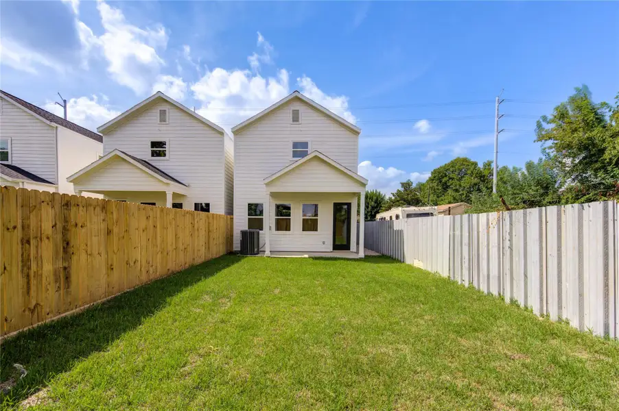 Front exterior of a new home in , Houston, TX, highlighting curb appeal (Image 2).