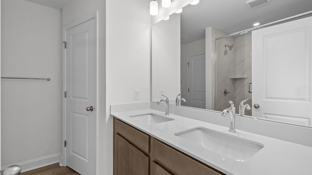 Furnished interior view inside a new home in Leigh Park, Charlotte (Image 11).