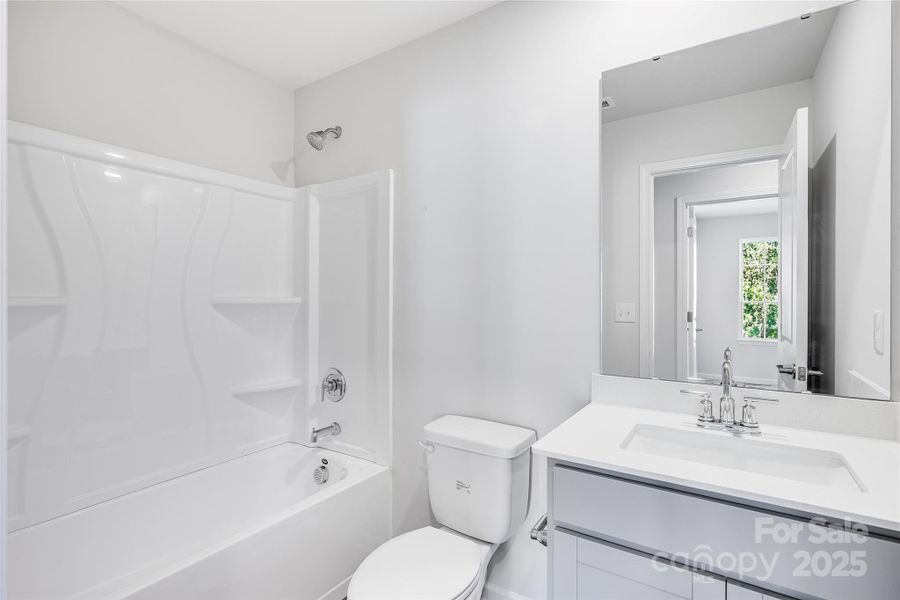 Furnished interior view inside a new home in Village of Waxhaw, Waxhaw (Image 9).