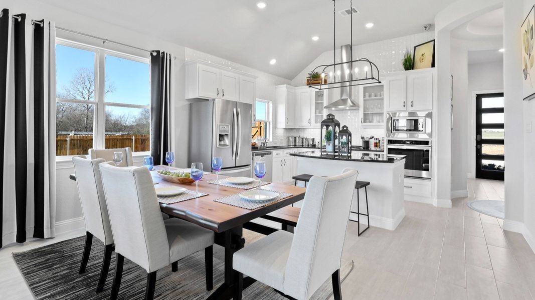 Representative furnished interior of a home built from the Laurel by Brightland Homes in Sunterra, Katy (Image 8).