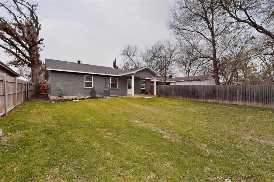Exterior details and patio area of a home in , White Settlement (Image 24).