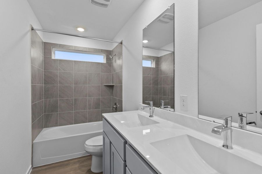 Furnished interior view inside a new home in Venetian Pines, Conroe (Image 6).
