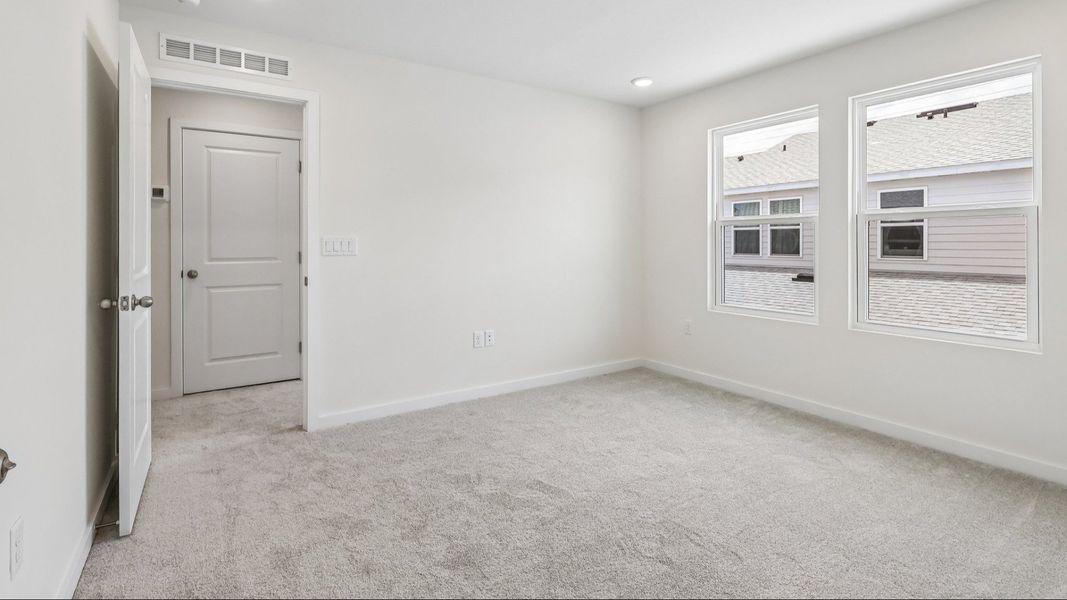 Furnished interior view inside a new home in Cyrene at Harmony, St. Cloud (Image 15).