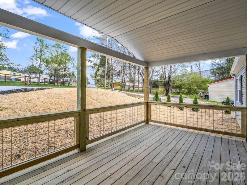 Exterior details and patio area of a home in , East Flat Rock (Image 17).