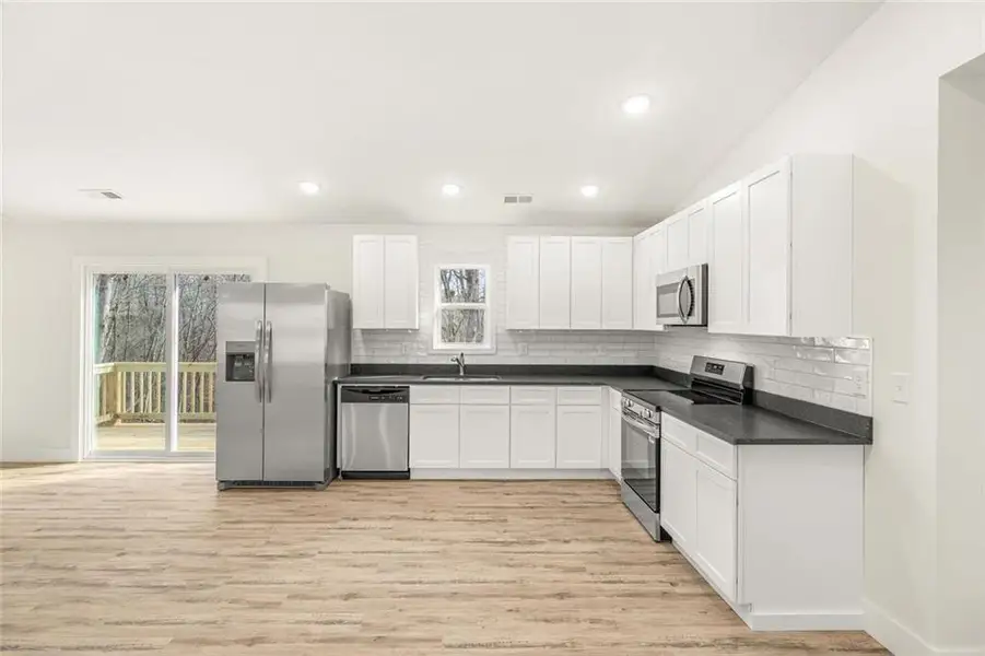 Furnished interior view inside a new home in , Gainesville (Image 4).