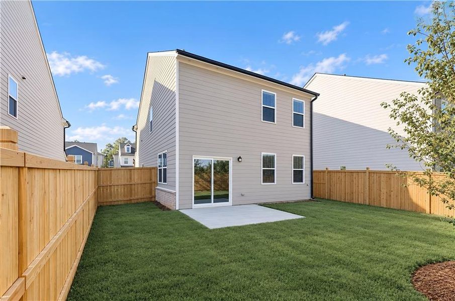 Exterior details and patio area of a home in Timber Ridge, Douglasville (Image 2).