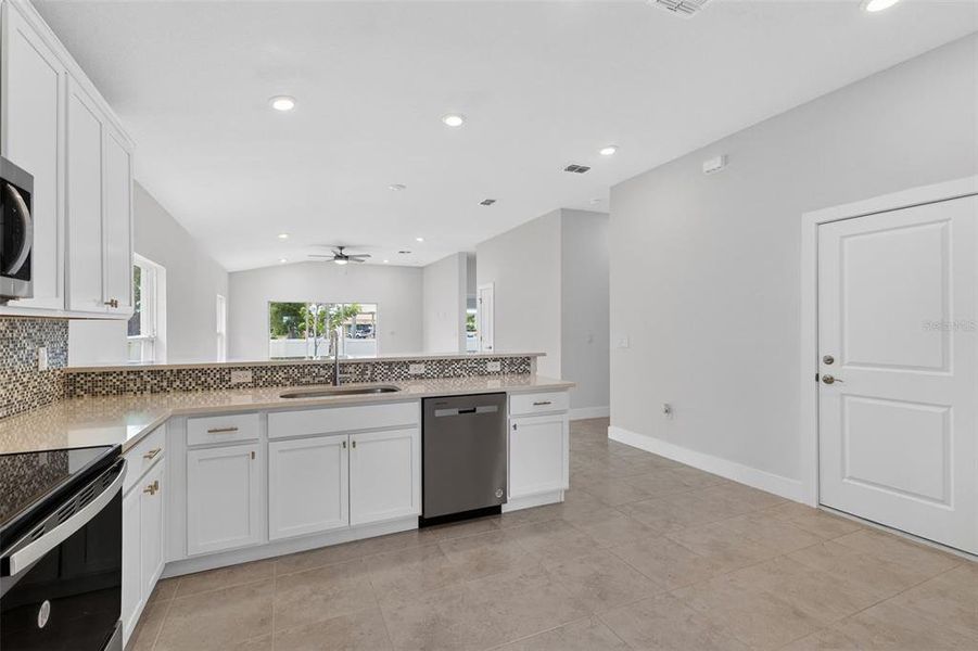 Furnished interior view inside a new home in , Port Charlotte (Image 10).