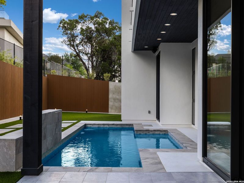 Exterior details and patio area of a home in , San Antonio (Image 39).
