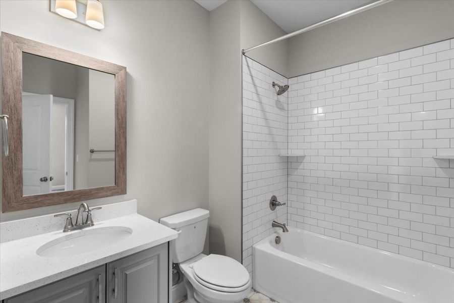 Downstairs Bathroom | 5511 Sweetwater Drive, Main-Level Suite Downstairs Bathroom | 5511 Sweetwater Drive, Main-Level Suite