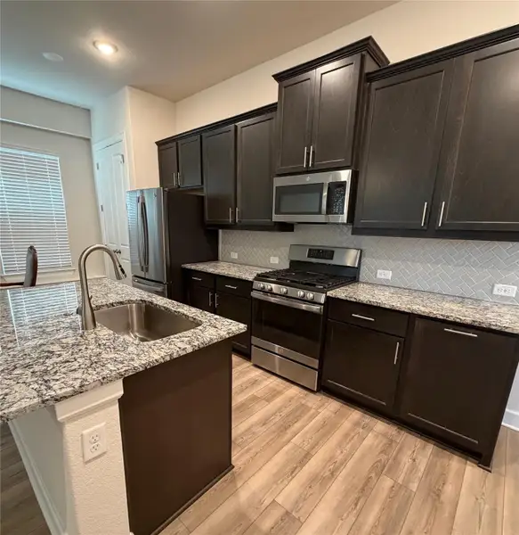 Furnished interior view inside a new home in , Dripping Springs (Image 4).