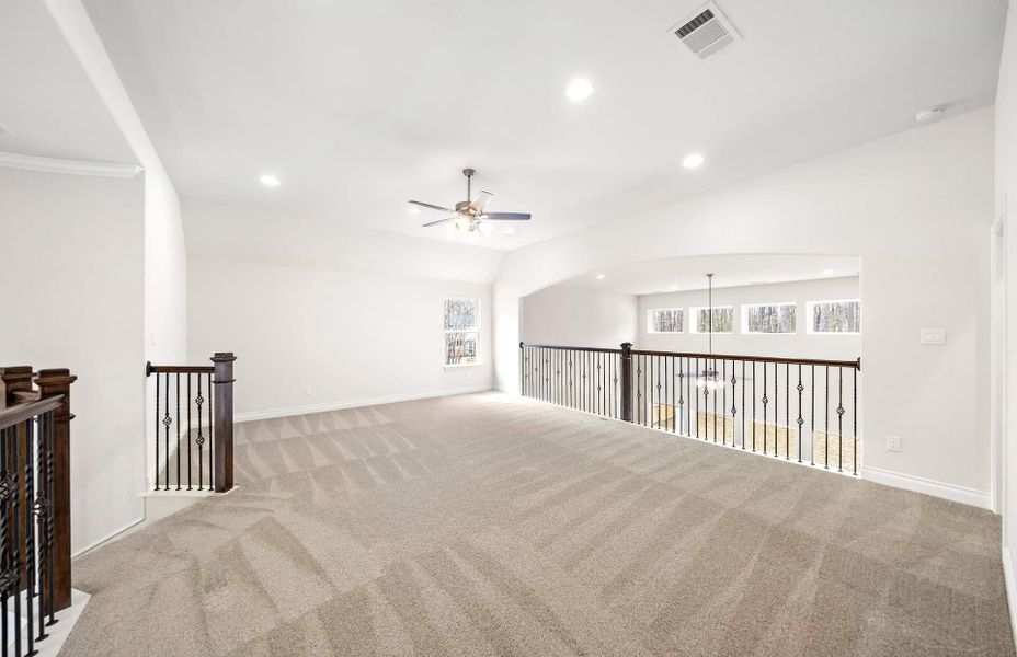 Representative unfurnished interior of a home built from the 3099 by Ravenna Homes in The Highlands 55′, Porter (Image 37). Representative unfurnished interior of a home built from the 3099 by Ravenna Homes in The Highlands 55′, Porter (Image 37).
