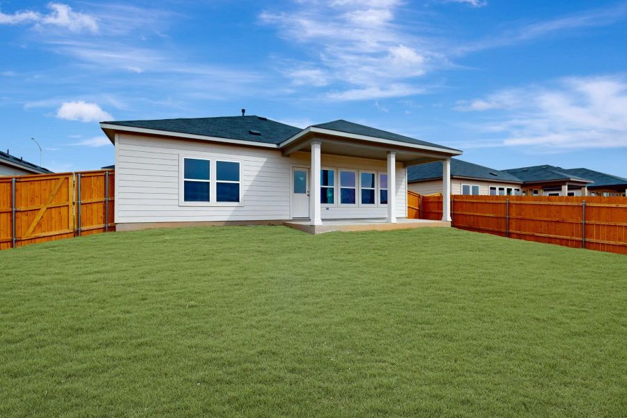 Exterior details and patio area of a home in Carillon, Manor (Image 3).
