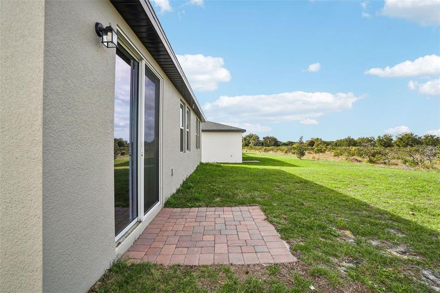 Exterior details and patio area of a home in Hamilton Bluff - Signature Series, Lake Hamilton (Image 25).