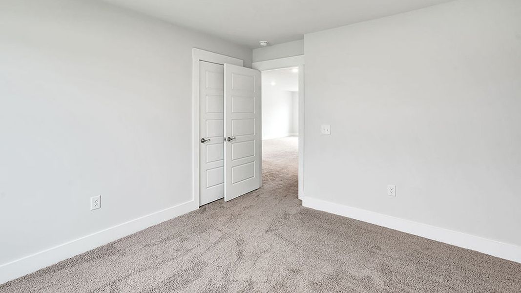 Spacious, unfurnished interior of a new home in The Landing at Sidbury Station, Castle Hayne (Image 27).