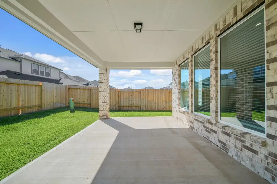 Exterior details and patio area of a home in Beacon Hill, Waller (Image 4). Exterior details and patio area of a home in Beacon Hill, Waller (Image 4).