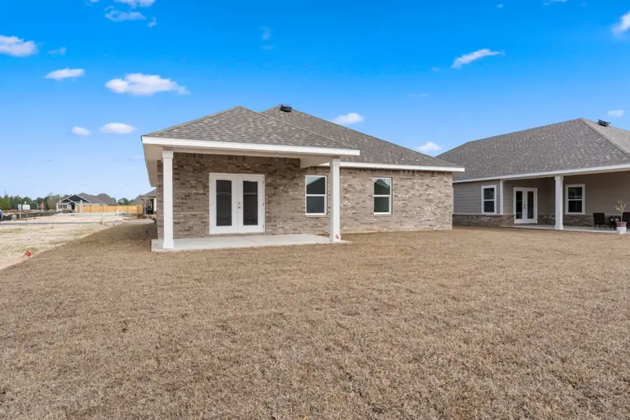 Exterior details and patio area of a home in Natureview, Freeport (Image 4). Exterior details and patio area of a home in Natureview, Freeport (Image 4).