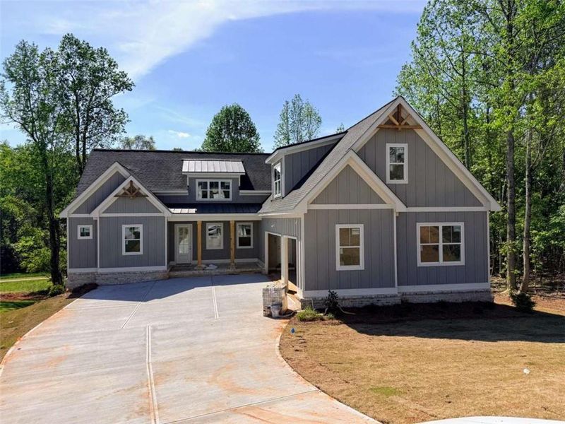 Front exterior of a new home in , Jefferson, GA, highlighting curb appeal (Image 12).