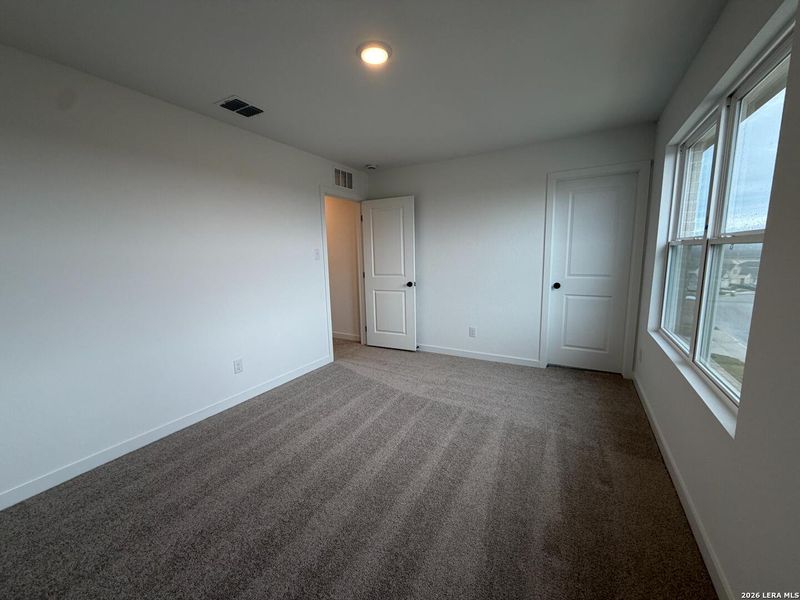 Spacious, unfurnished interior of a new home in The Wilder, Adkins (Image 27).