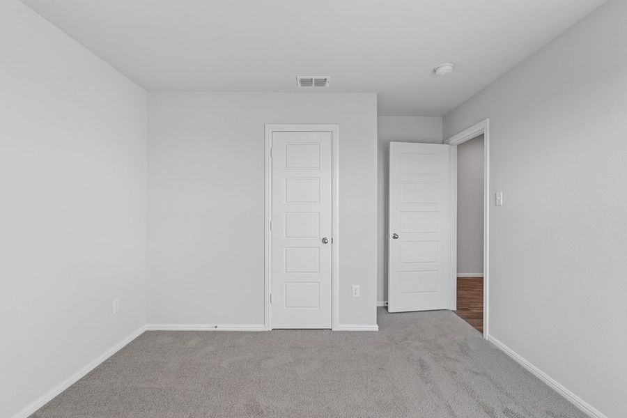 Representative unfurnished interior of a home built from the TEXAS CALI by D.R. Horton in Faculty Row, Abilene (Image 56).