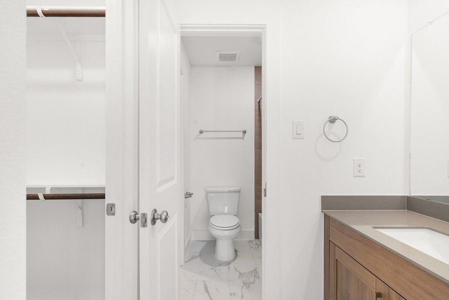 Furnished interior view inside a new home in Parkside on the River, Georgetown (Image 16).