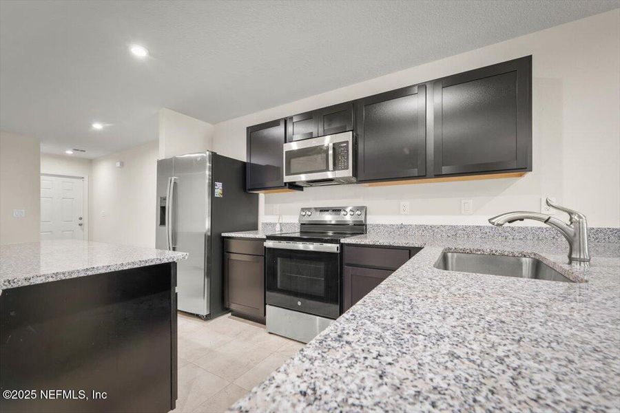 Furnished interior view inside a new home in , Jacksonville (Image 11). Furnished interior view inside a new home in , Jacksonville (Image 11).