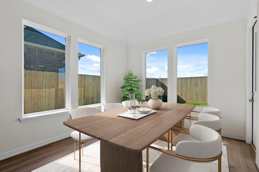 The dining area is a perfect blend of style and functionality, providing an inviting space for memorable meals and gatherings.